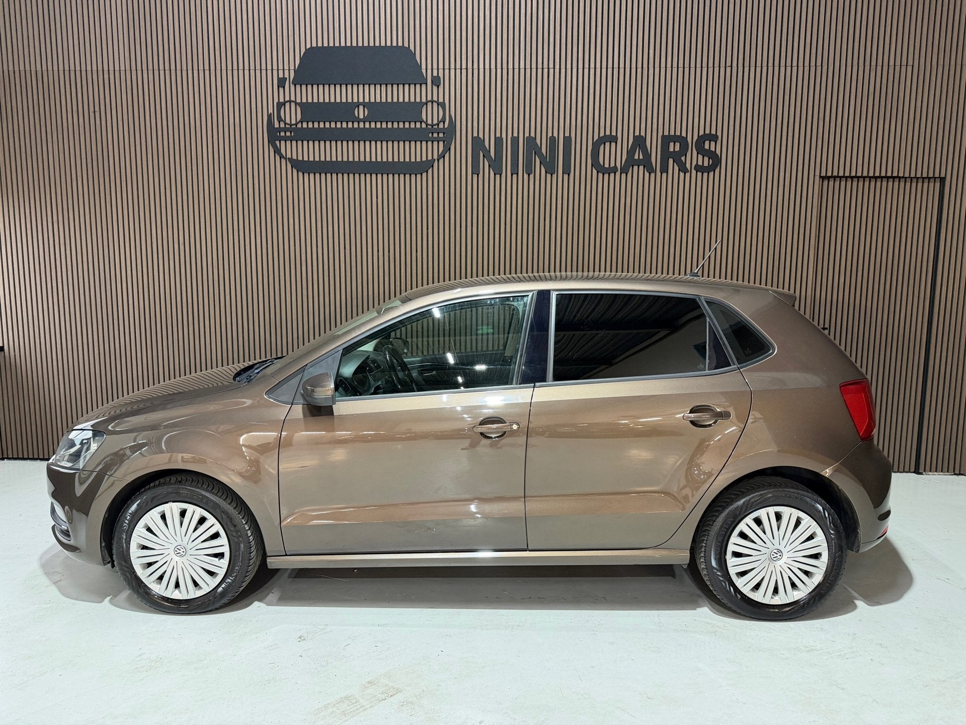 Volkswagen Polo 1.2 TSI Highline Volledig onderhouden, Auto's, Start-stop-systeem, Euro 6, 4 cilinders, Bruin