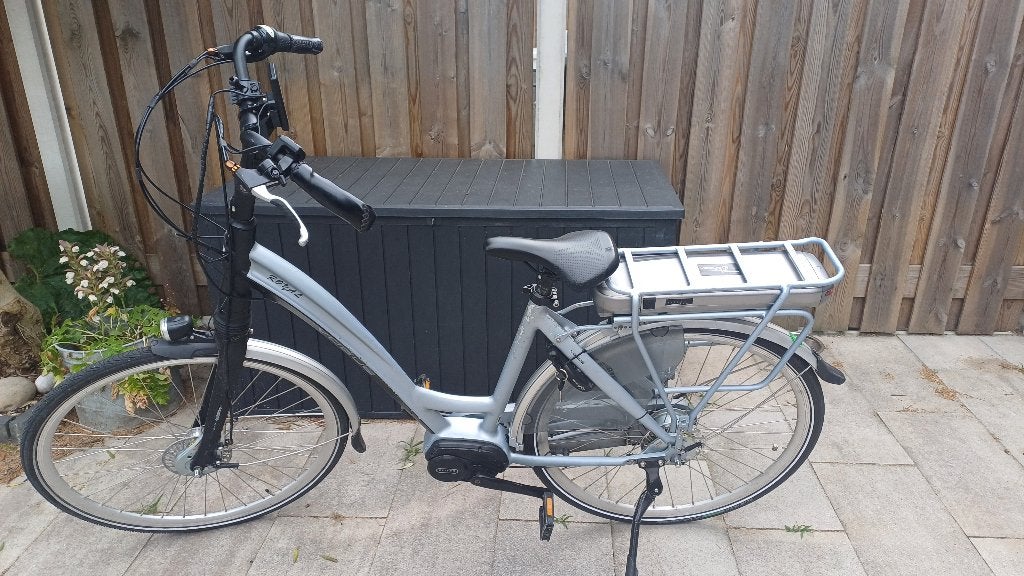 Vogue elektrische fiets, Ophalen, Gebruikt, 30 tot 50 km per accu, Overige merken
