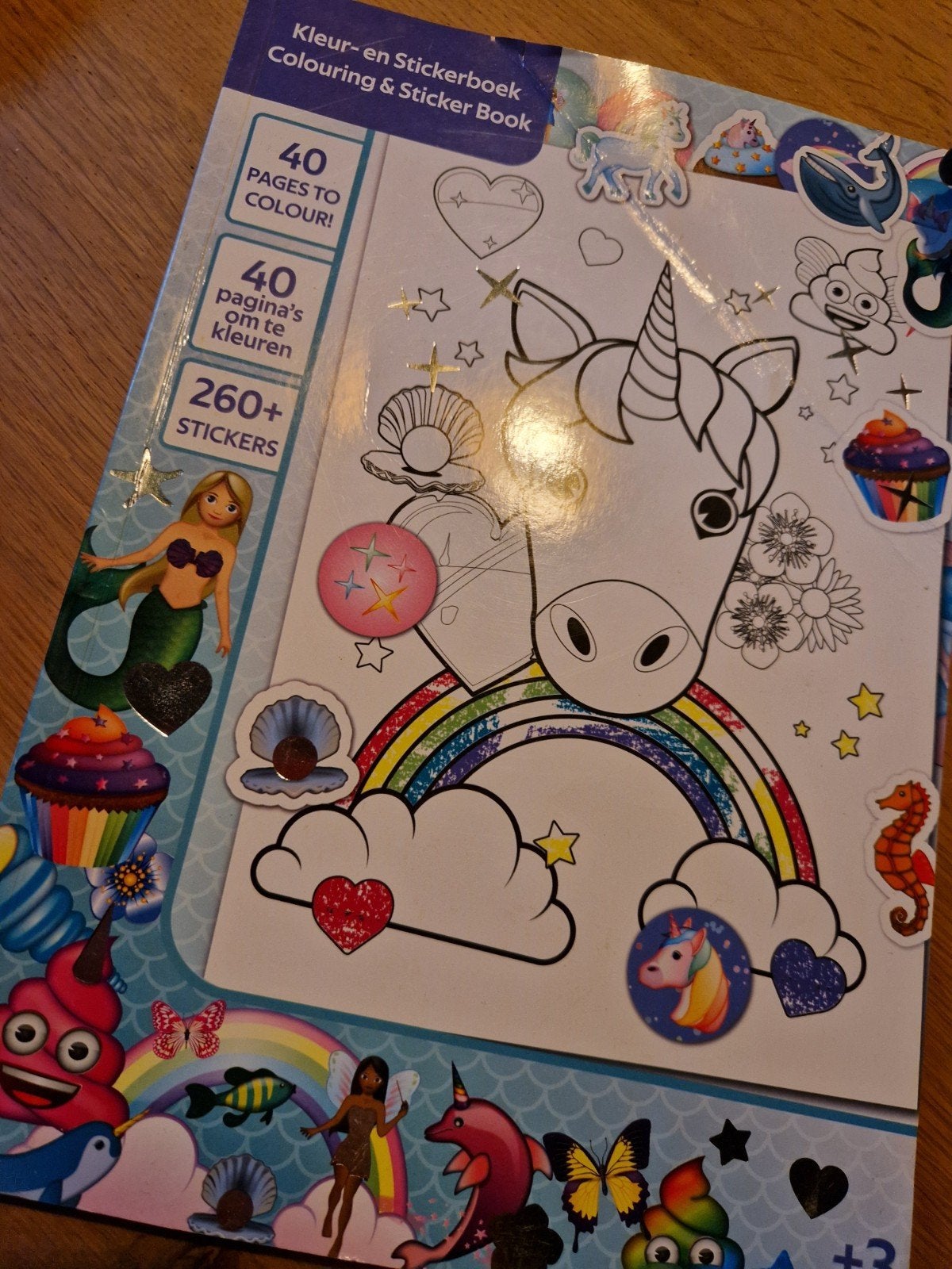 KLEUR EN STICKERBOEK UNICORN, Ophalen of Verzenden, Zo goed als nieuw