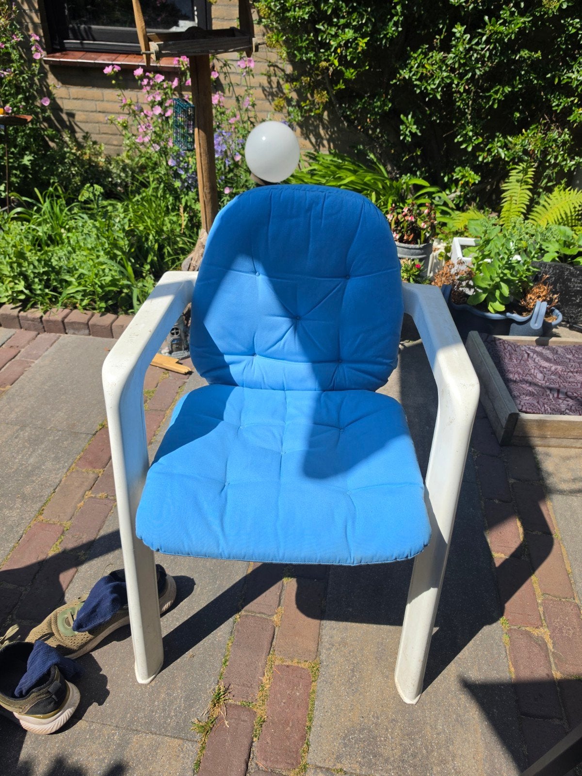 4 Hartman tuinstoelen met blauwe kussens, Ophalen