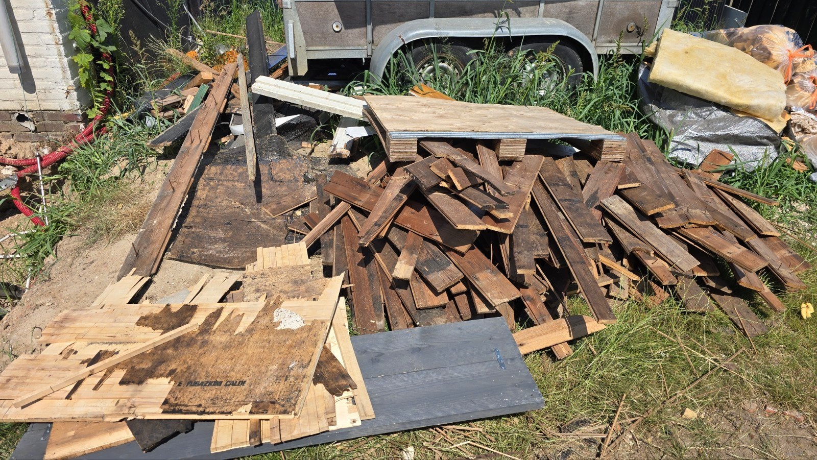 Grote stapel brandhout en hout, Tuin en Terras, 6 m³ of meer, Ophalen