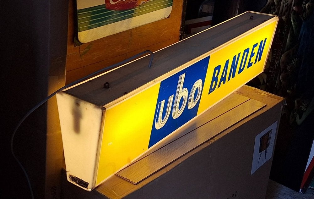 Mooie vintage reclamelichtbak van UBO banden., Ophalen, Gebruikt, ., Lichtbak of (neon) lamp