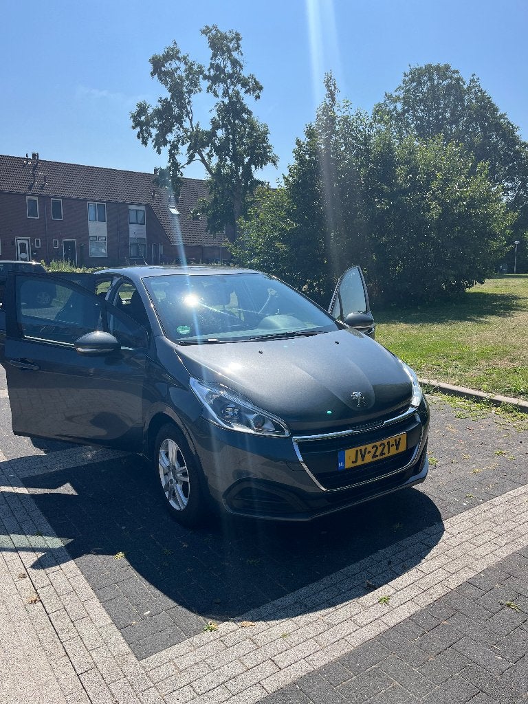 Peugeot 208 1.2 Puretech 2016 Grijs, Auto's, Voorwielaandrijving, Stof, 1199 cc, 23 km/l