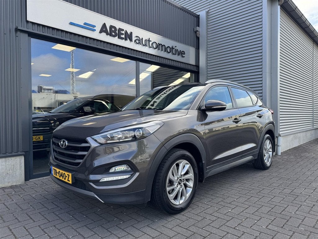 Hyundai Tucson 1.6 T-GDI 177PK 4WD Comfort automaat (NAVI|CA, Auto's, Hyundai, 4 cilinders, Bruin, 1434 kg, Bedrijf