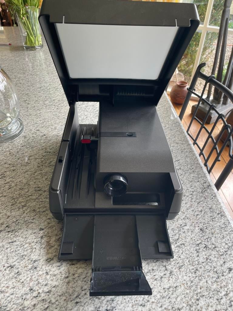 Diaprojector/viewer met afstandbediening, Ophalen