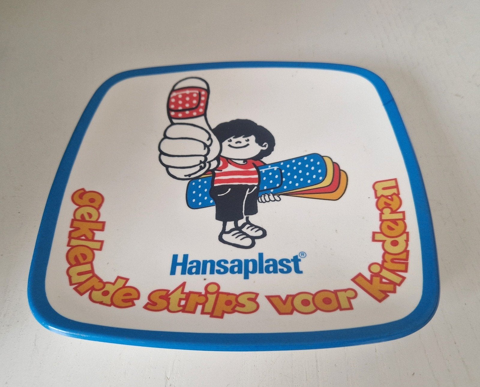 Hansaplast bordje van plastic, Verzamelen, Ophalen of Verzenden, Overige typen