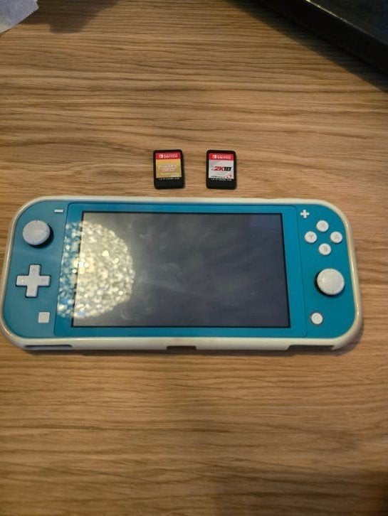 Nintendo Switch Lite met games en cover, Spelcomputers en Games, Spelcomputers | Nintendo Switch Lite, Ophalen of Verzenden, Turquoise