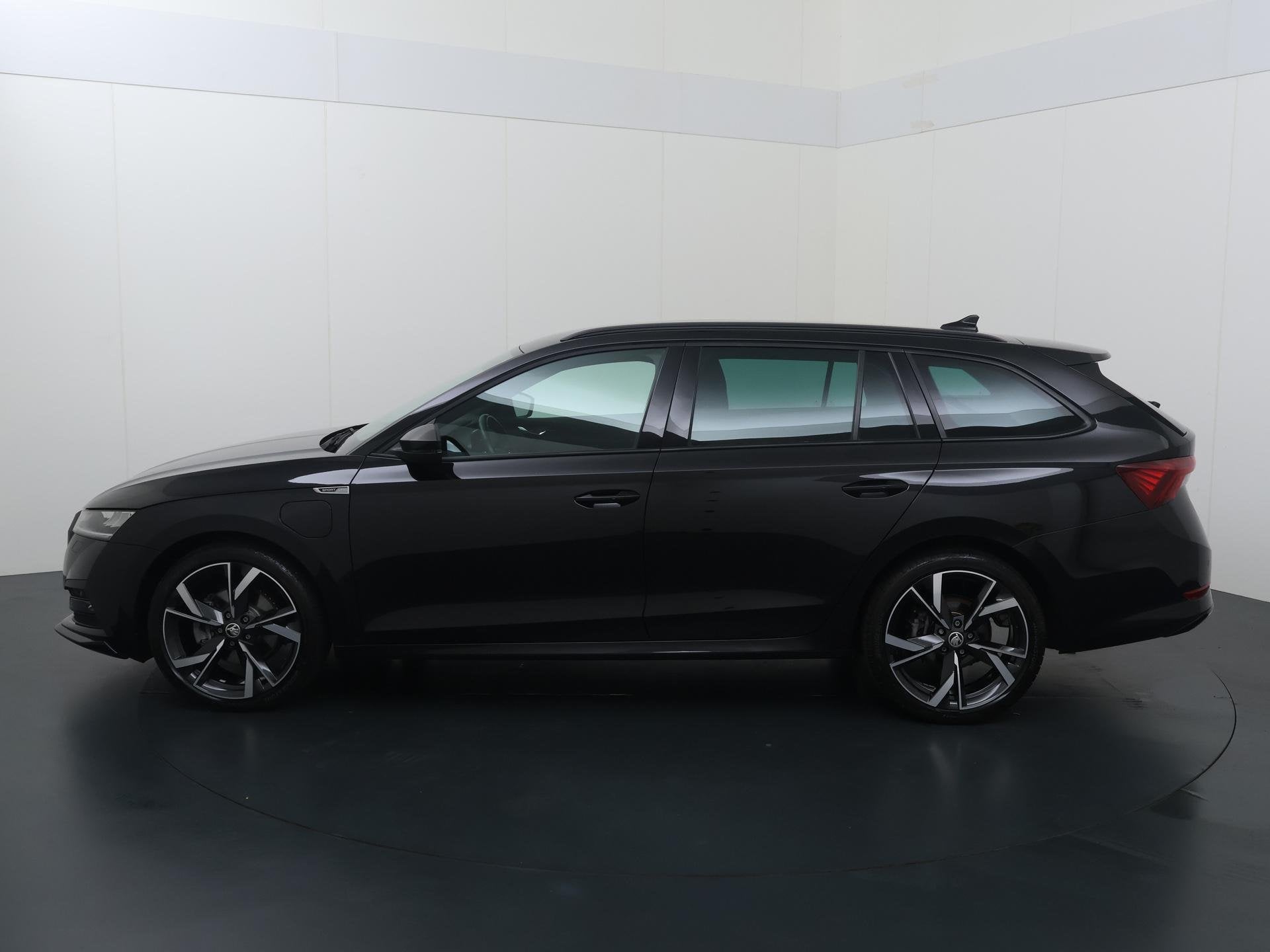 Skoda Octavia Combi 1.4 TSI iV PHEV Sportline Business | 204, Auto's, 12 maanden, Stof, Gebruikt, 4 cilinders