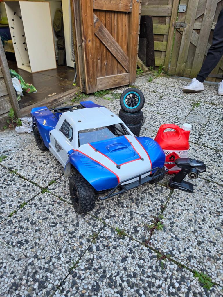 Short course 1/5 rc auto, Benzine, Auto offroad, Ophalen of Verzenden, Zo goed als nieuw