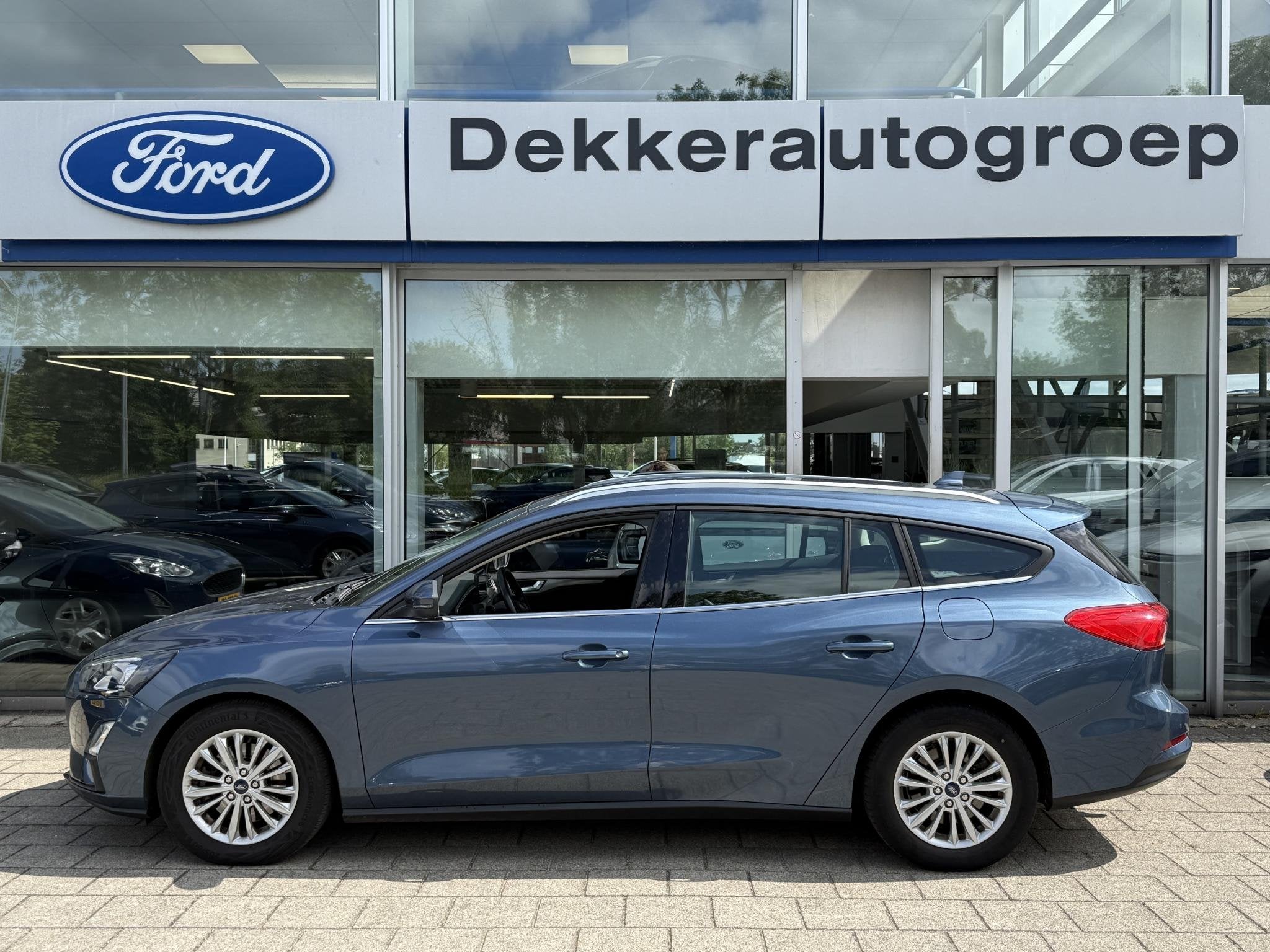 Ford Focus Wagon 1.0 EcoBoost Titanium +, Gebruikt, Euro 6, Automatische klimaatregeling, Origineel Nederlands