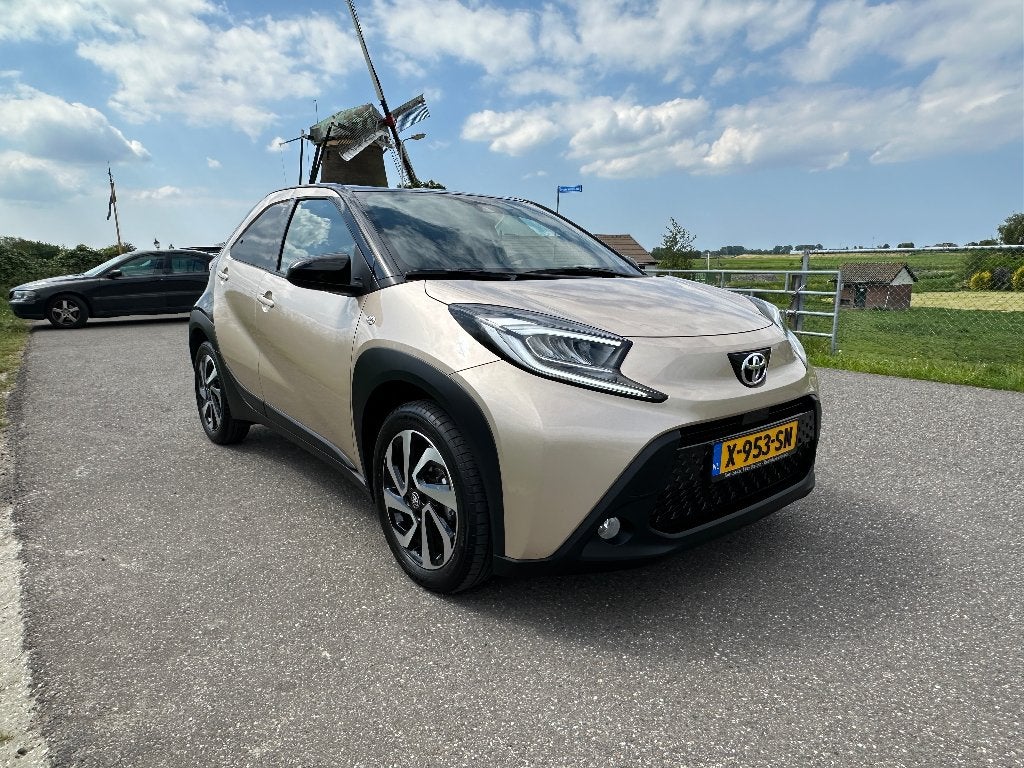 Toyota Aygo X 1.0 Vvt-i-S VCT Pulse Automaat 2024, Stof, Bruin, 4 stoelen, Origineel Nederlands