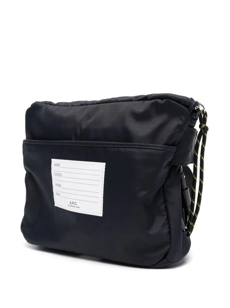 Farfetch - A.P.C. Heuptas met logopatch, Overige merken, Blauw, Mailto:customerservice@farfetch.com, The Bower 4th Floor 211 Old Street London EC1V 9NR Verenigd Koninkrijk