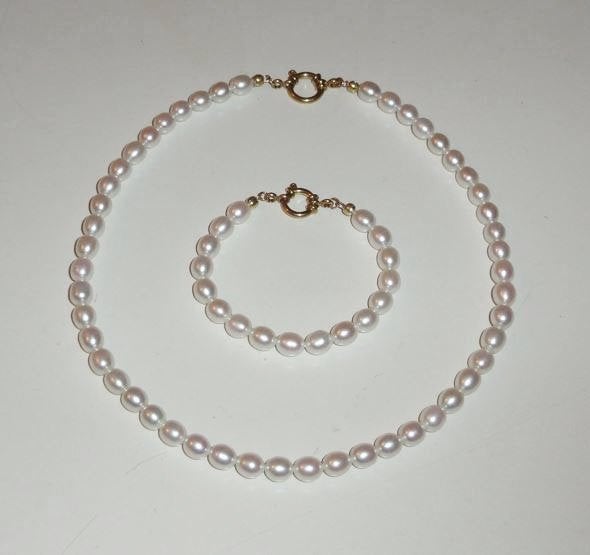 Ketting Parels ovaal met armband rvs slotjes, Verzenden, Nieuw, Overige kleuren, Overige materialen