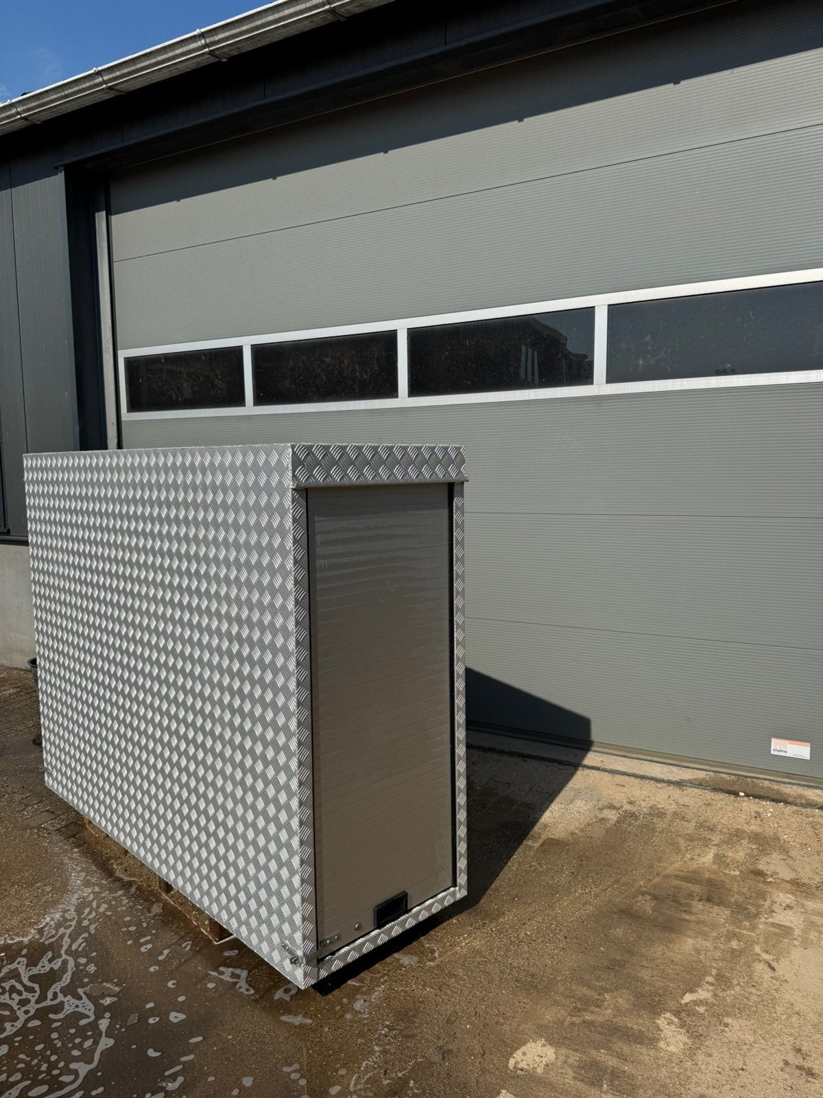 Aluminium opbergkist met rolluiken, Ophalen