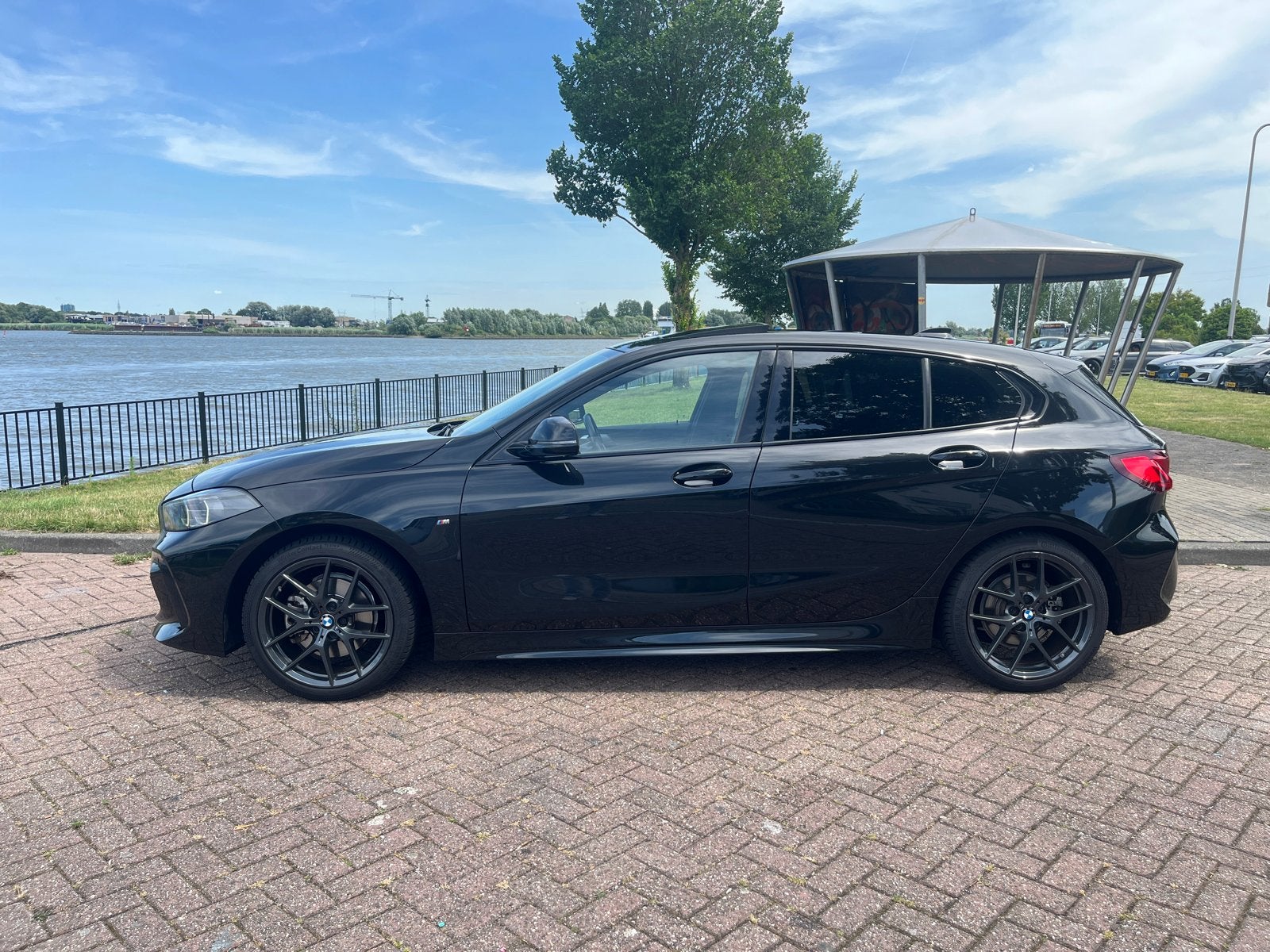 BMW 1-Serie 118i full optie MET GRATIS ONDERHOUDSBEURT, Auto's, 136 pk, Zwart, Startonderbreker, Particulier