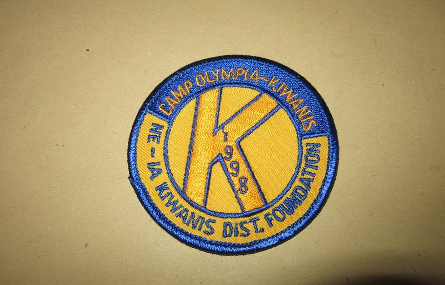 Scouting embleem camp olympia-kiwanis 1998, Verzenden, Nieuw, Embleem, Speld of Insigne