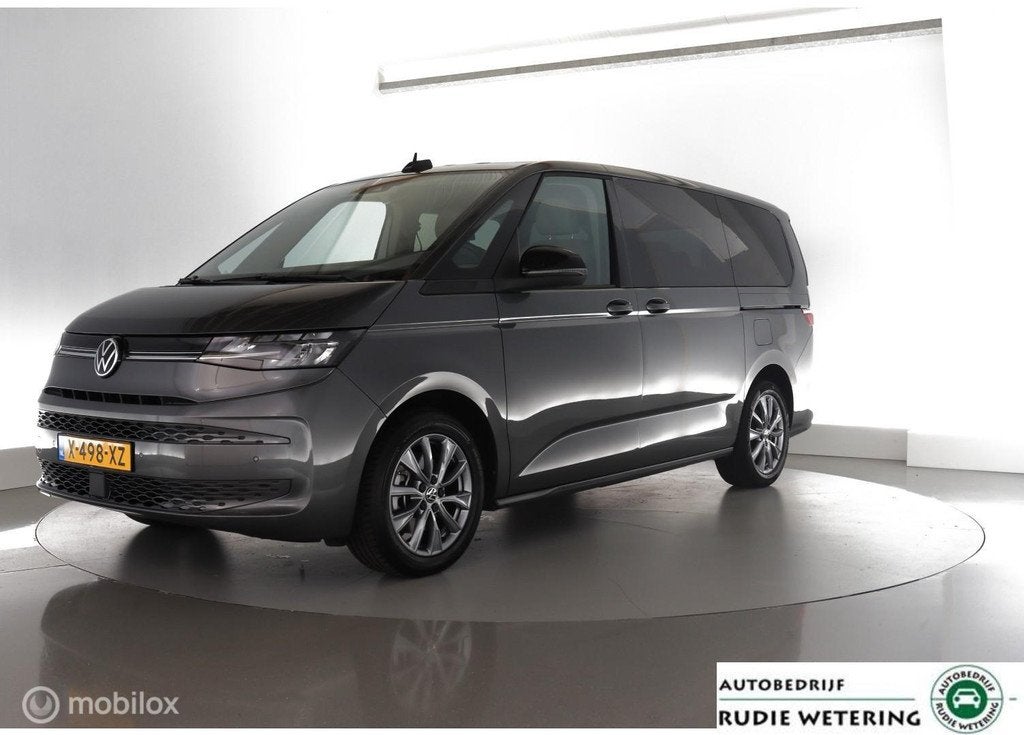 Volkswagen Multivan 1.4 eHybrid 212PK L2H1 Life Business 7 P, Auto's, Volkswagen, Stof, Gebruikt, Euro 6, 138 €/maand