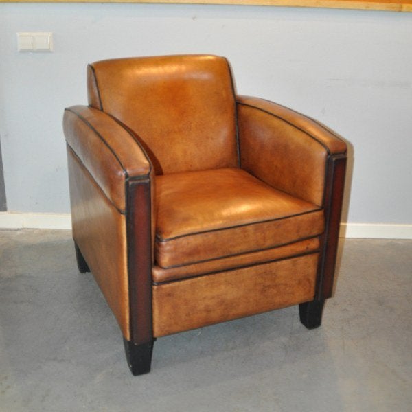 Bergerac, schapenleren Art Deco fauteuil, Ophalen, Zo goed als nieuw, 50 tot 75 cm, Leer
