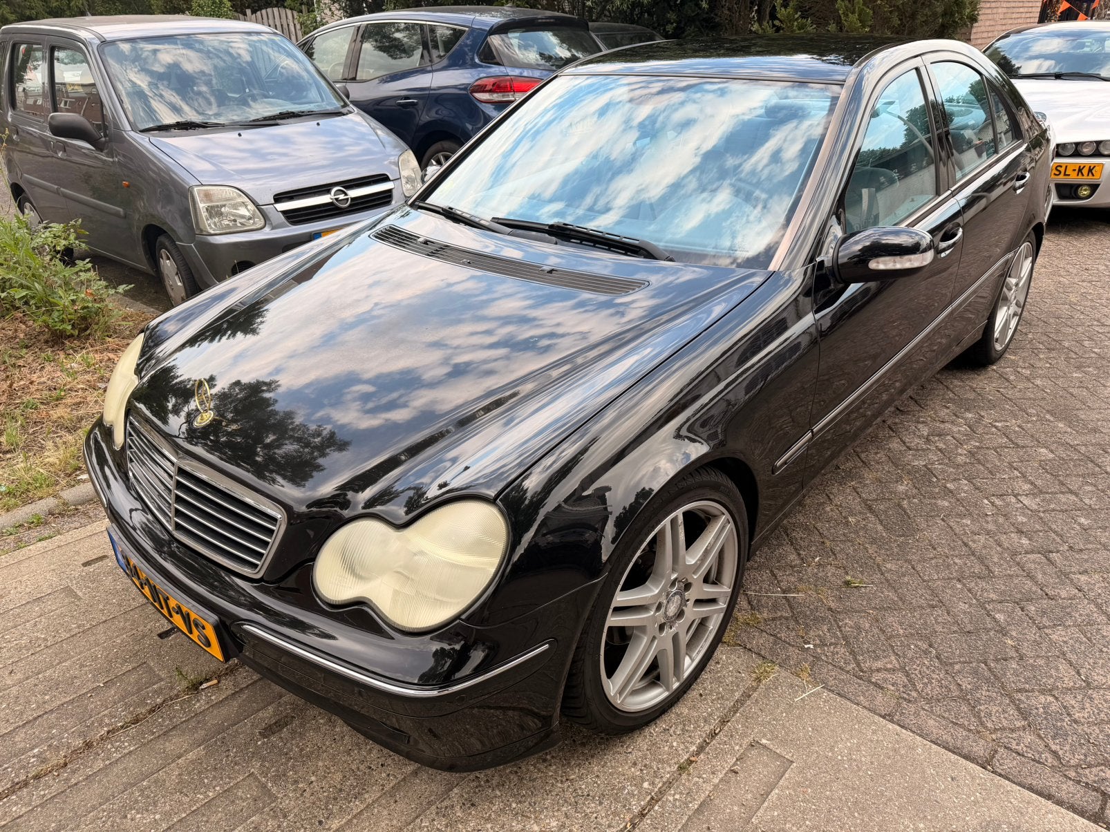 Mercedes-Benz C-Klasse 1.8 C180 Kompr Sedan AUT 2004 Zwart, Auto's, Mercedes-Benz, Automaat, 1796 cc, Zwart, Origineel Nederlands