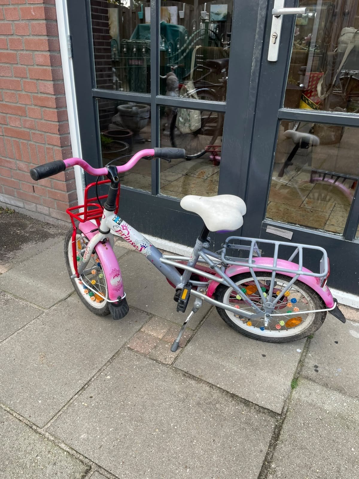 Roze kinderfiets met mandje 14 inch loekie, Ophalen, Gebruikt, Velgrem