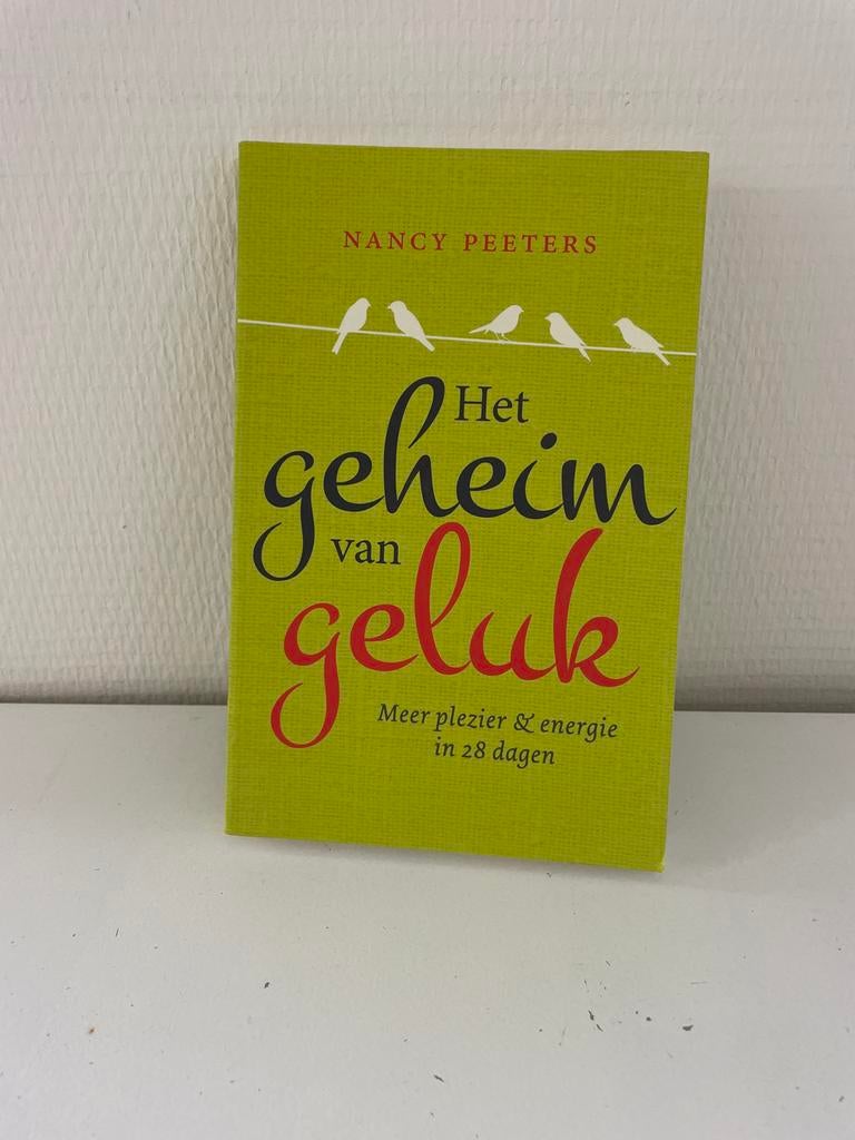 Het geheim van geluk - Nancy Peeters, Ophalen of Verzenden, Zo goed als nieuw