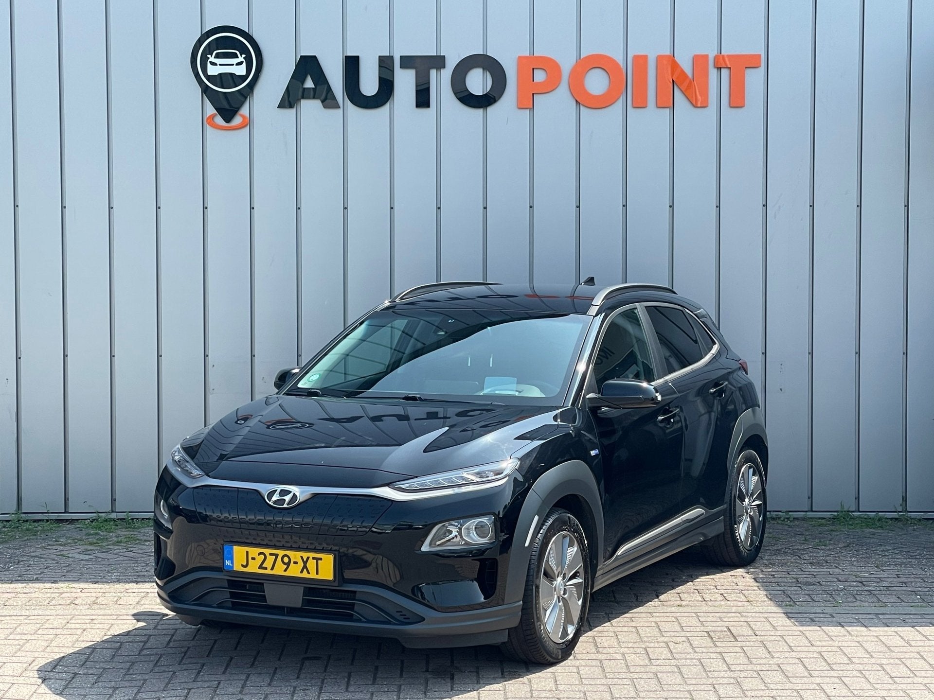 Hyundai Kona EV Fashion 64 kWh FASE3 WARMTEPOMP SOH100%|HEAD, Auto's, Stof, Gebruikt, 80 min, Zwart