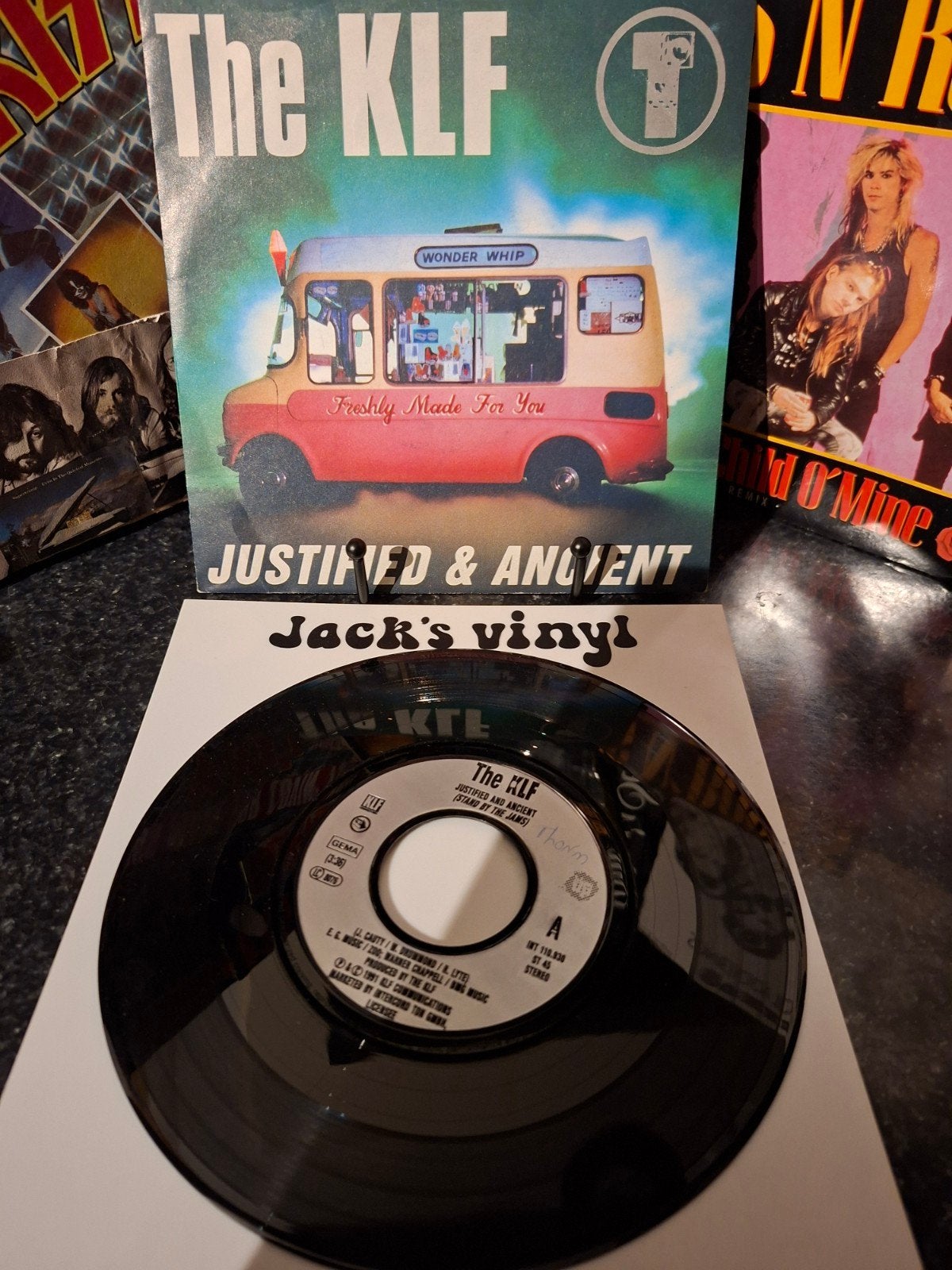 The KLF - Justified & Ancient 7 inch vinyl single 1991, 7 inch, Ophalen of Verzenden, Zo goed als nieuw, Fotohoes