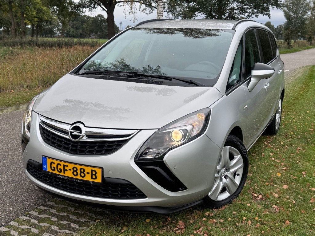 Opel ZAFIRA TOURER / 1.4i / AIRCO / 7 PERSOONS / RIJKLAAR, Auto's, Gebruikt, Huisgarantie, 4 cilinders, Met garantie (alle)