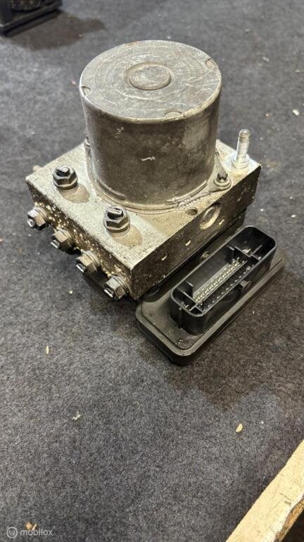 ABS pomp Volkswagen Polo 6R ('09-'14) 6C0907379G, Gebruikt, Volkswagen, Ophalen of Verzenden, Volkswagen