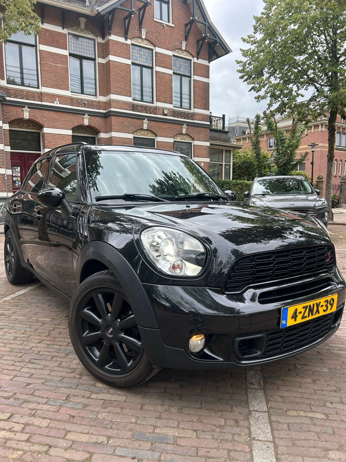 Mini Countryman 1.6 Cooper S AUT 2011 Zwart, Auto's, Zwart, 14 km/l, Particulier, 1000 kg