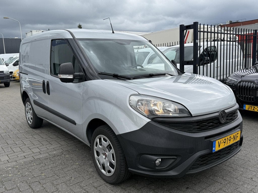 Fiat Doblò Cargo 1.4 T-Jet L1H1 SX 120Pk Benzine Volledig d, Auto's, Bestelauto's, Voorwielaandrijving, Stof, Gebruikt, 4 cilinders