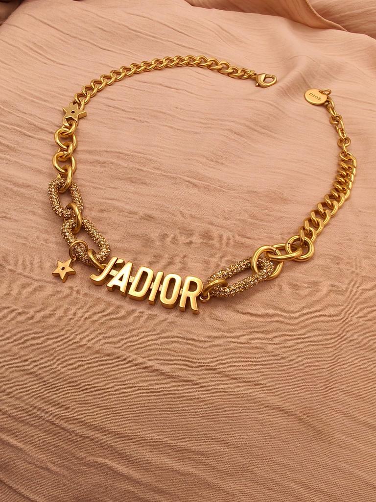 J'ADIOR ketting goudkleurig met strass en sterhanger, Overige materialen, Nieuw, Ophalen of Verzenden, Goud