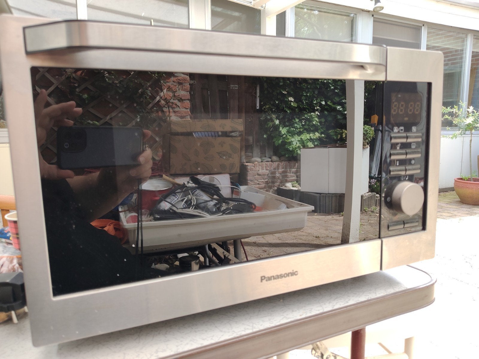 Panasonic NN-C69KSMEPG Combimagnetron 1000W, Ophalen