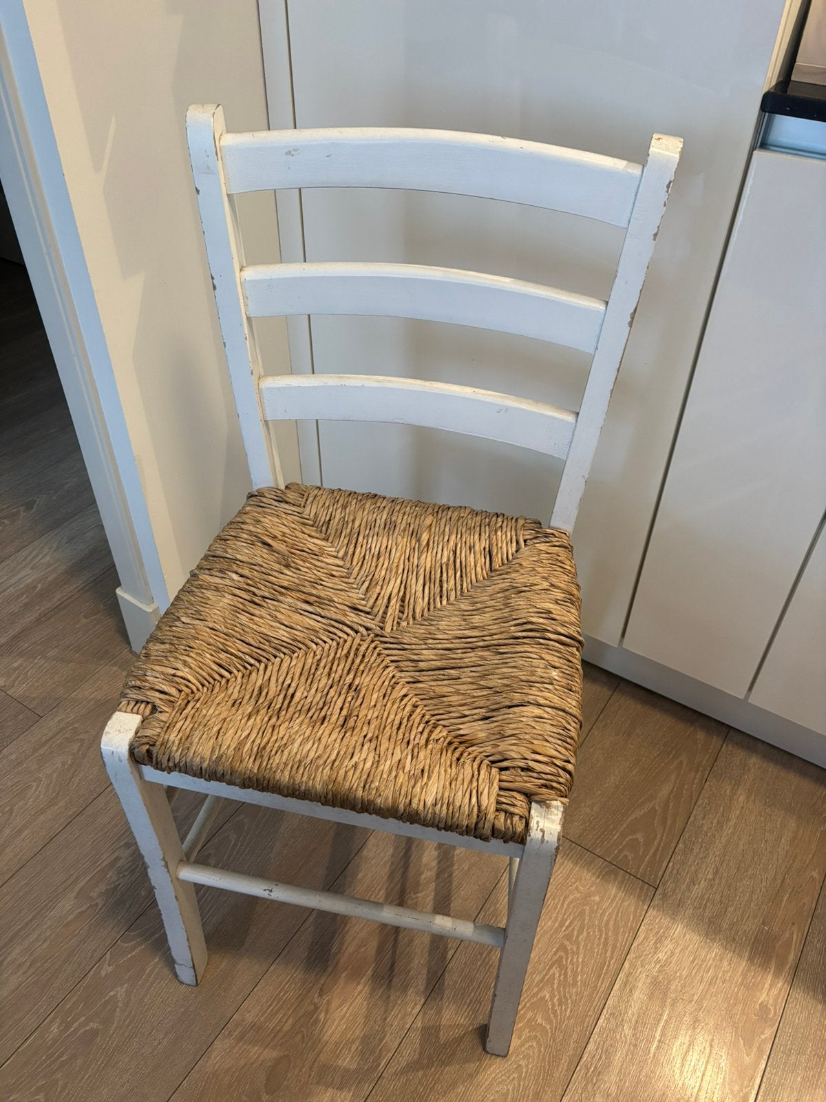 Wooden chair with natural woven seat, Ophalen