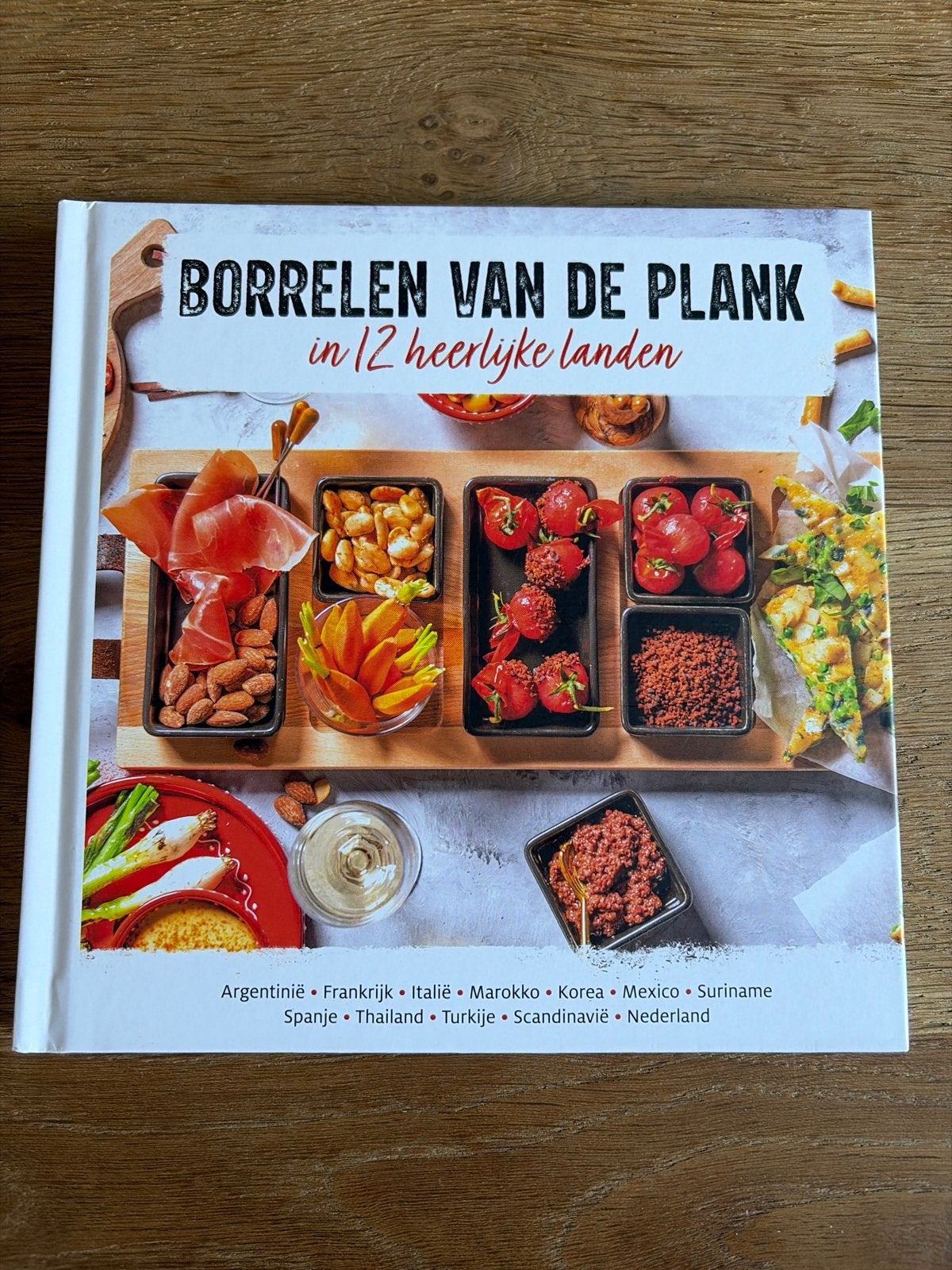 Borrelen van de Plank in 12 heerlijke landen, Boeken, Ophalen of Verzenden, Zo goed als nieuw, Overige gebieden, Tapas, Hapjes en Dim Sum
