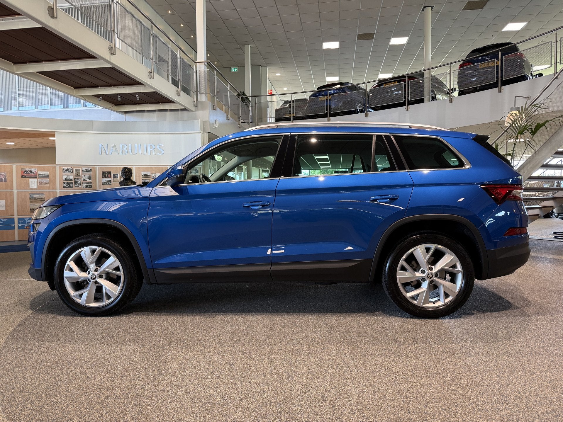 Skoda Kodiaq 1.5 TSI Business Edition DSG, Trekhaak, Camera,, 12 maanden, 4 cilinders, Blauw, 14 km/l