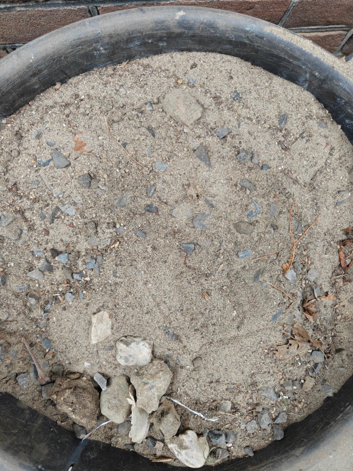 Gratis af te halen; zand en grind vermengd, Ophalen