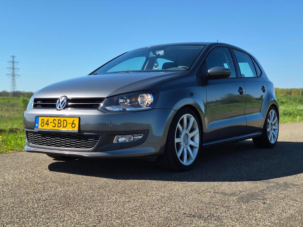 Volkswagen Polo 1.2 TSI 77KW 2011 Grijs, Auto's, Volkswagen, Voorwielaandrijving, Stof, 40 €/maand, Euro 6