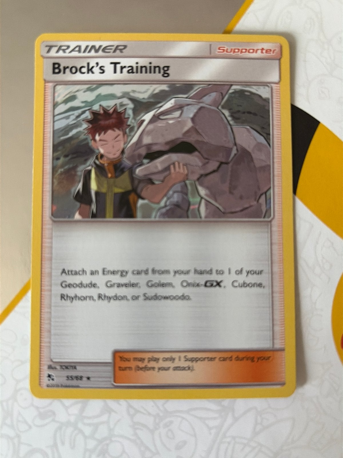Brock's Training 55/68 Holo Hidden Fates Pokémon Kaart, Ophalen of Verzenden, Zo goed als nieuw, Losse kaart, Foil
