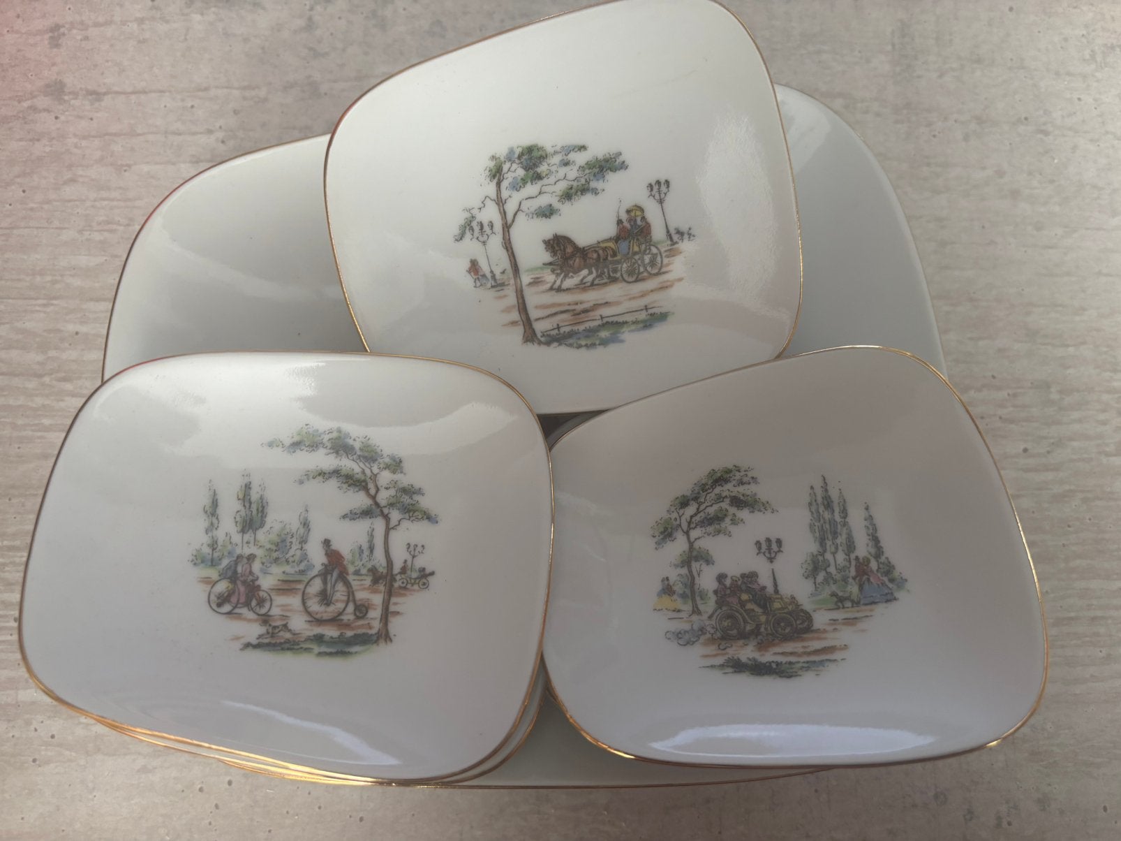 Set van 6 vierkante schoteltjes met landelijke taferelen, Ophalen