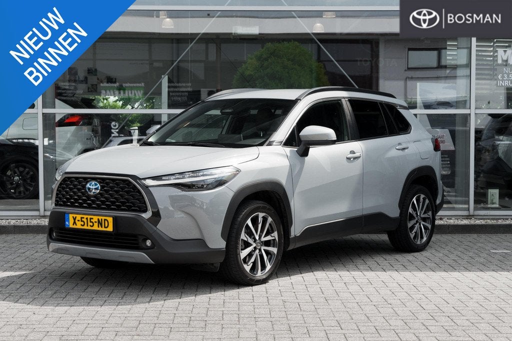 Toyota Corolla Cross Hybrid 140 Business Plus, Auto's, Gebruikt, 4 cilinders, Leder en Stof, Origineel Nederlands