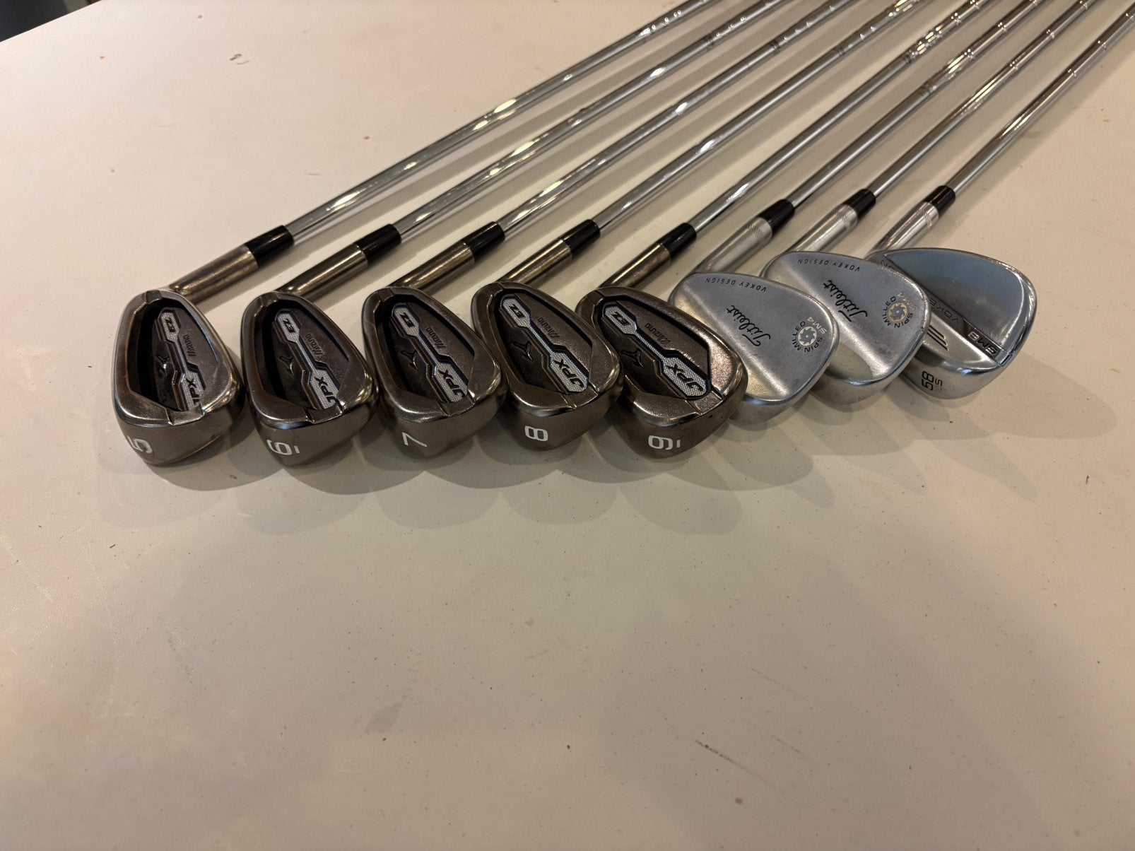 Mizuno JPX EZ 2016 ijzerset + Titleist Vokey wedges, Sport en Fitness, Ophalen of Verzenden, Gebruikt, Set, Mizuno