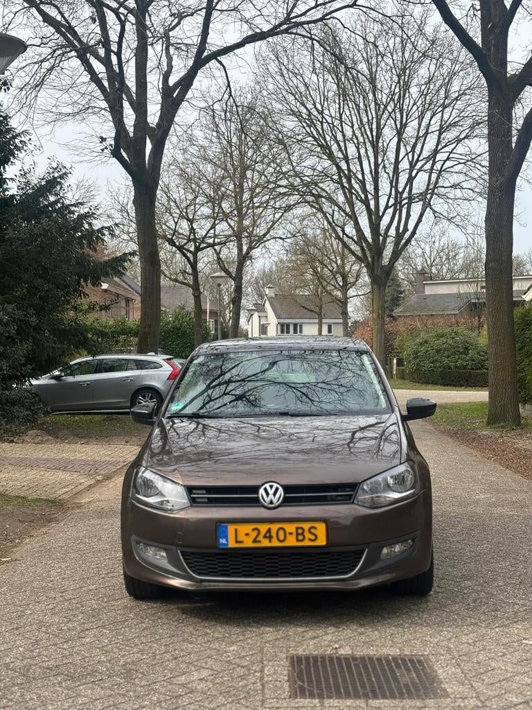 Volkswagen Polo 1.2 TSI 66KW 2012 Bruin Km :193.000, Auto's, Achterwielaandrijving, 40 €/maand, Zwart, 4 cilinders