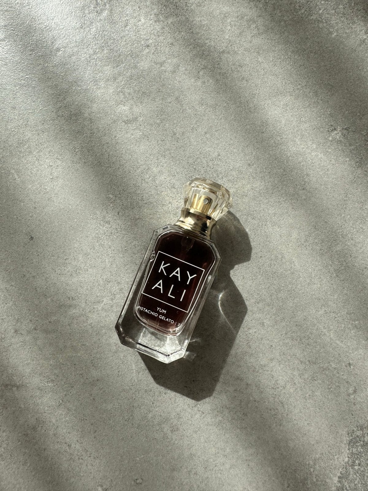 Kayali Yum Pistachio Gelato - 10ml Eau de Parfum, Sieraden, Tassen en Uiterlijk, Ophalen of Verzenden, Zo goed als nieuw