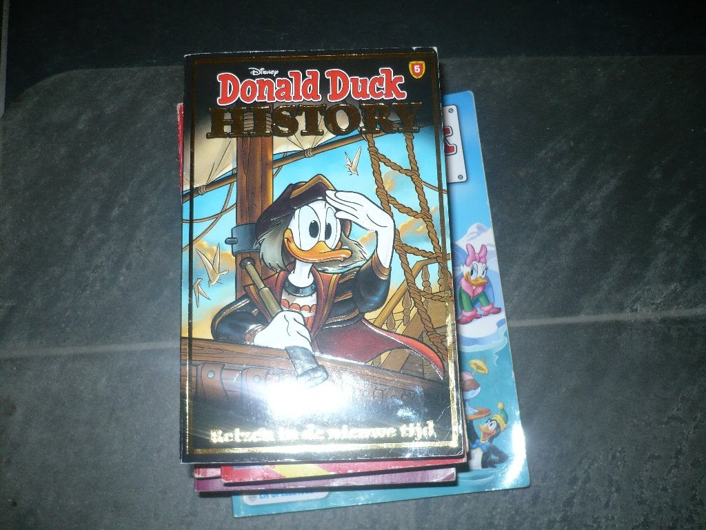 6 speciale uitgave donald duck pockets en 1 vakantie boek, Gelezen, Ophalen of Verzenden, Donald Duck, Meerdere stripboeken
