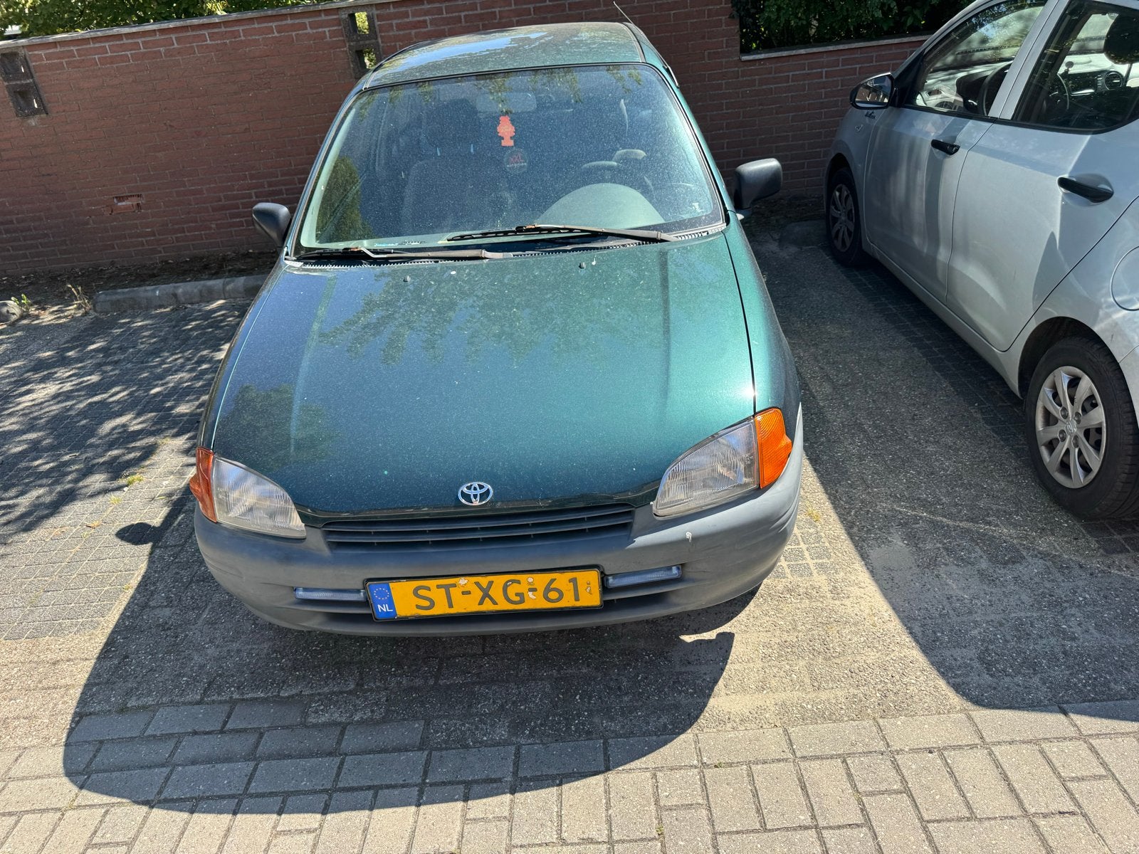 Toyota Starlet 1.3 16V AUT 1998 Groen, Auto's, Automaat, 4 cilinders, Starlet, 400 kg