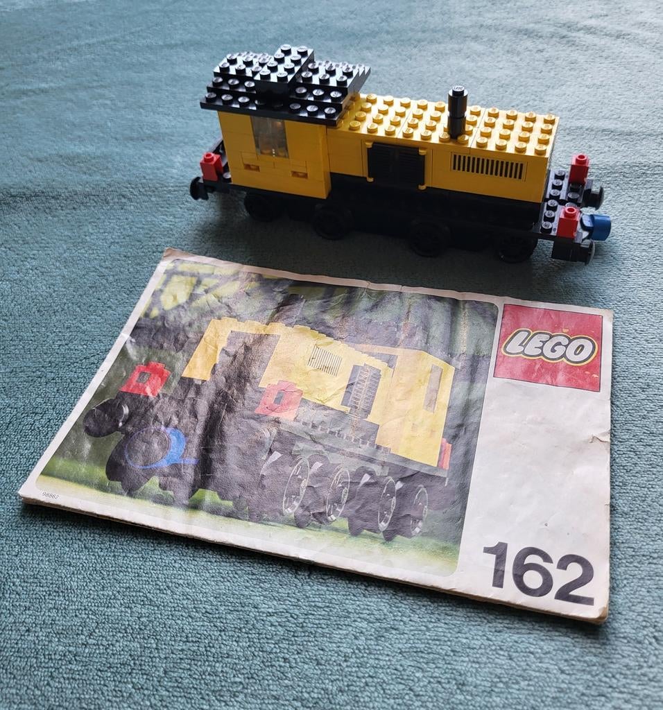 Lego trein 12 Volt blauwe rails locomotief (set 162) boekje., Gebruikt, Lego, Compleet, Ophalen of Verzenden