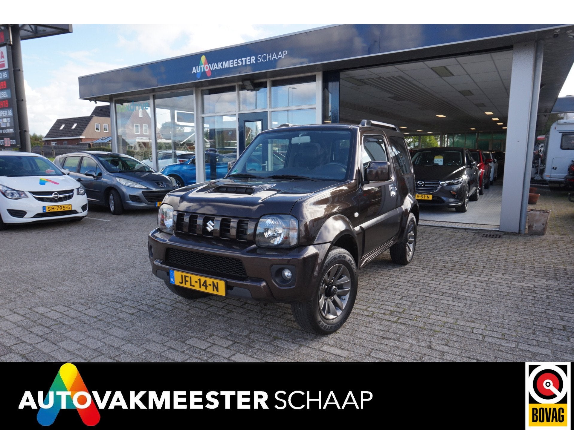 Suzuki Jimny 1.3 Exclusive , 75dkm Incl nw apk/beurt & 12 mn, Auto's, Keurmerk '100% Onderhouden', 86 pk, Gebruikt, Zwart