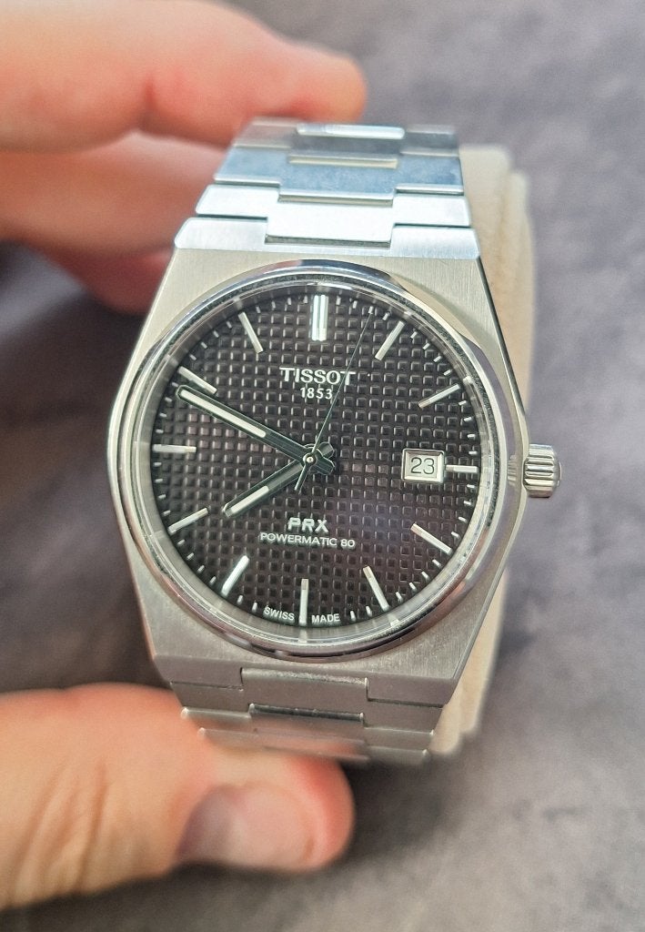 Tissot PRX Powermatic 80 40mm Zwart, Sieraden, Tassen en Uiterlijk, Overige merken, Staal, Staal, Polshorloge