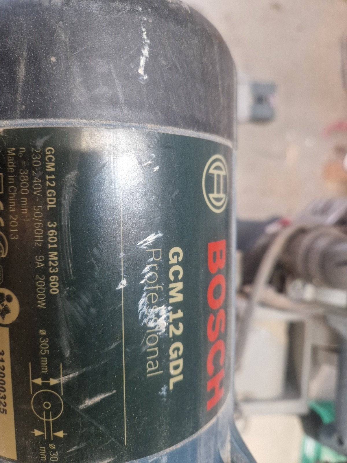 Bosch Afkortzaag GCM 12 GDL 305mm met onderstel, Ophalen